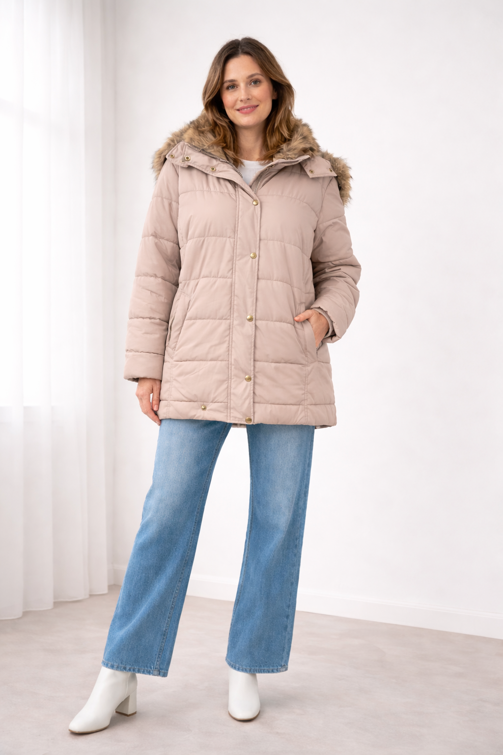 Blush quilted snap-front jacket with a faux fur trimmed hood