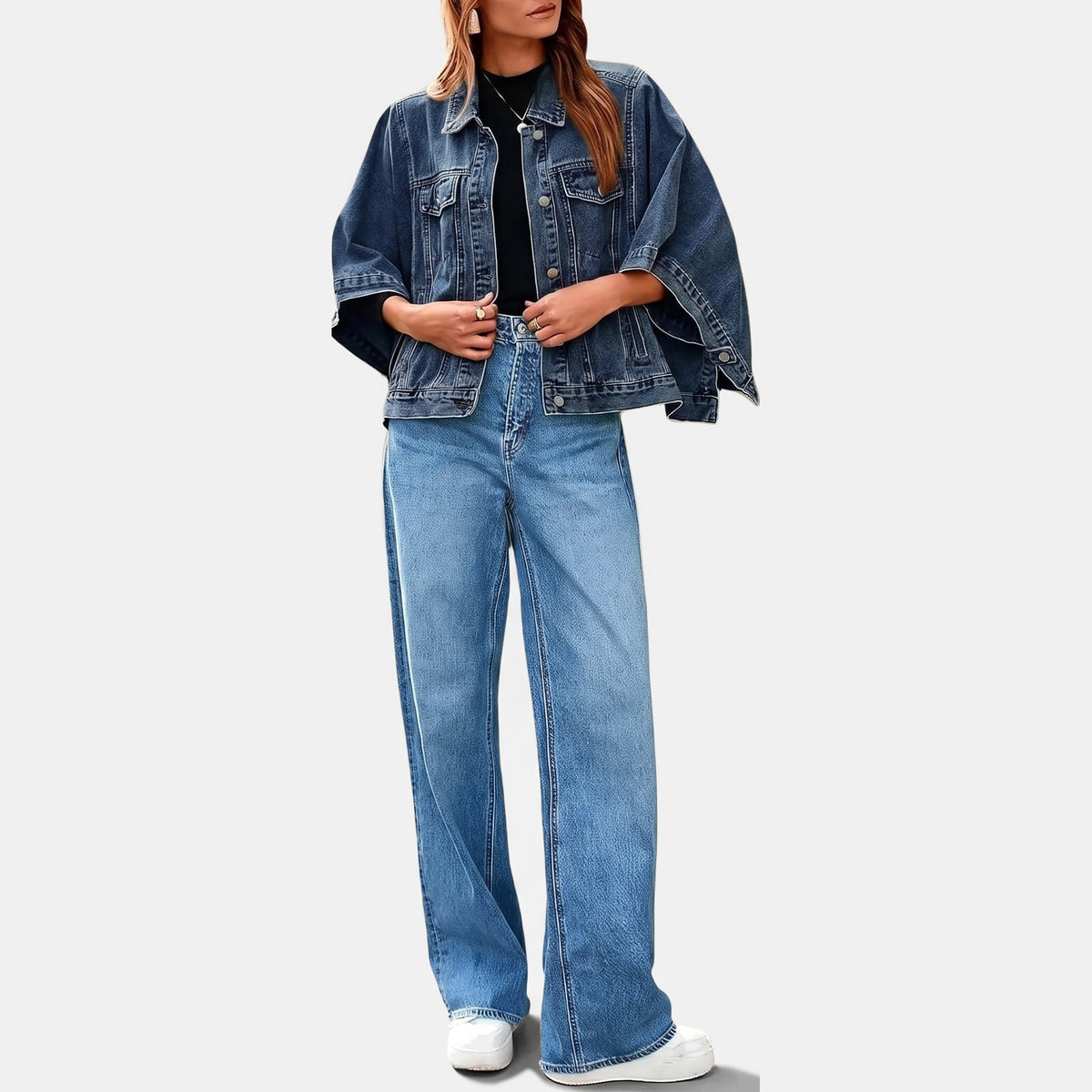 Dark wash cropped denim jacket with cape sleeves, full length view