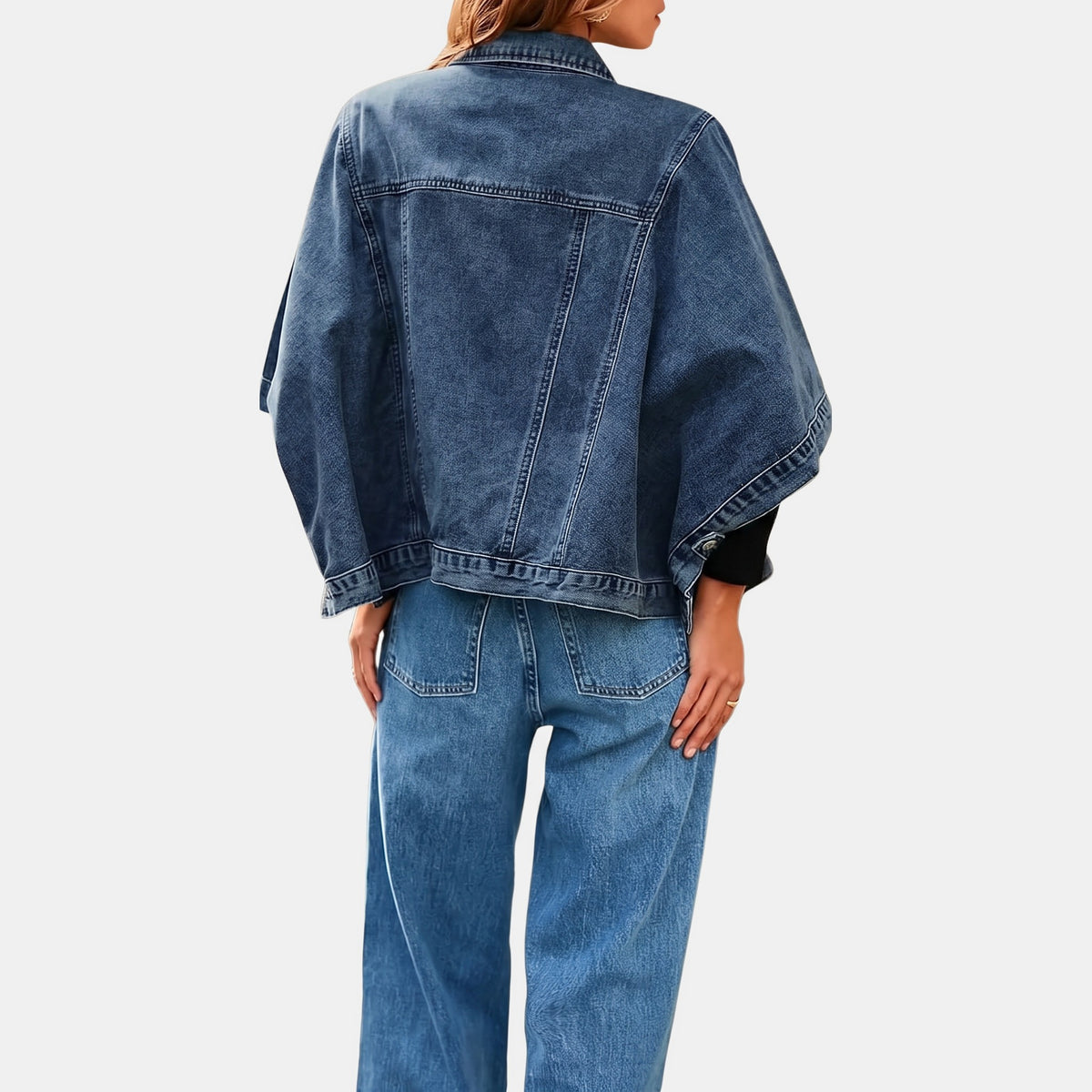Back view of the dark wash batwing denim jacket