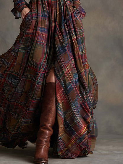 Close up of the burgundy plaid skirt and brown boots