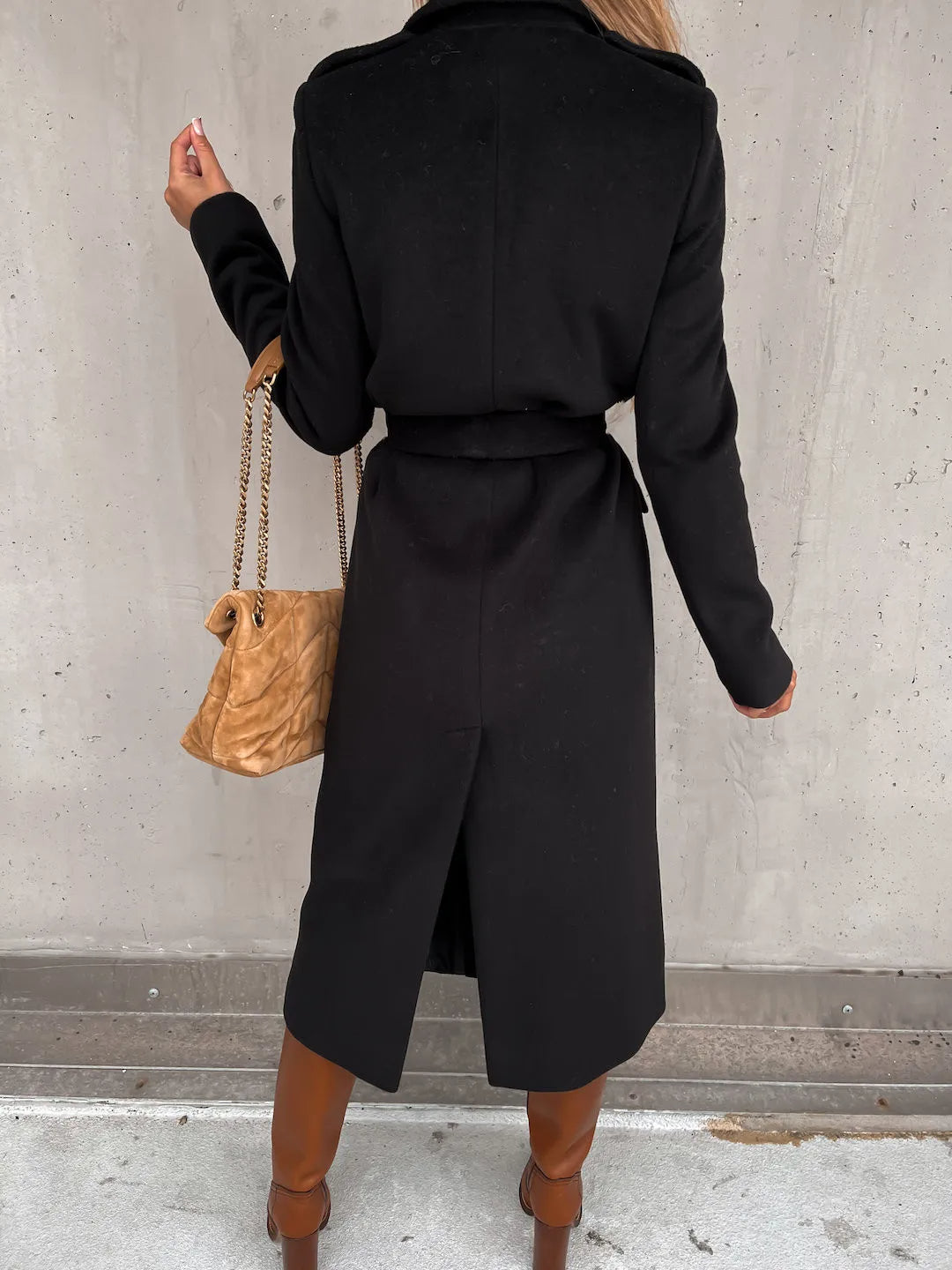 Back view of the black belted shawl collar coat