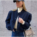 Navy cropped baseball collar jacket worn, front