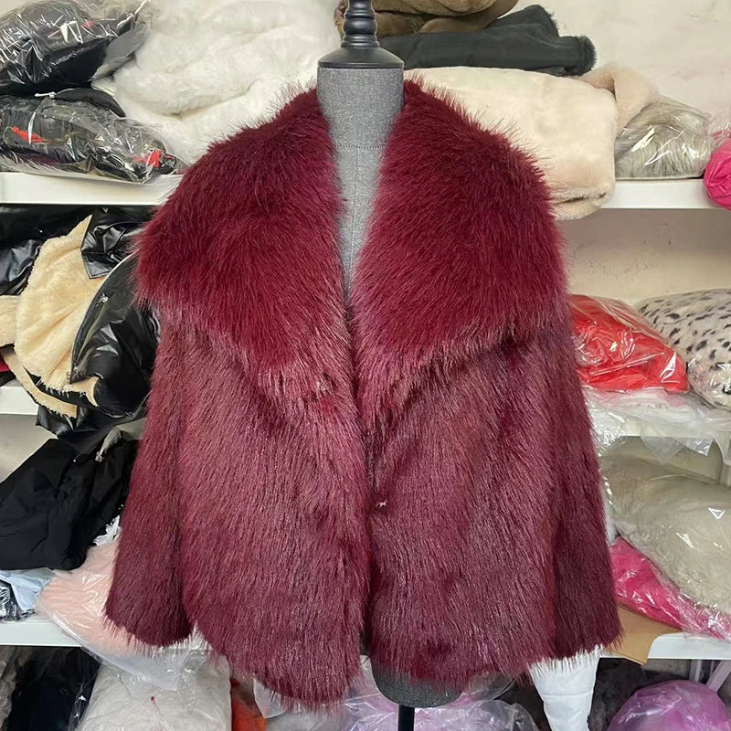 Burgundy faux fur jacket on a dress form