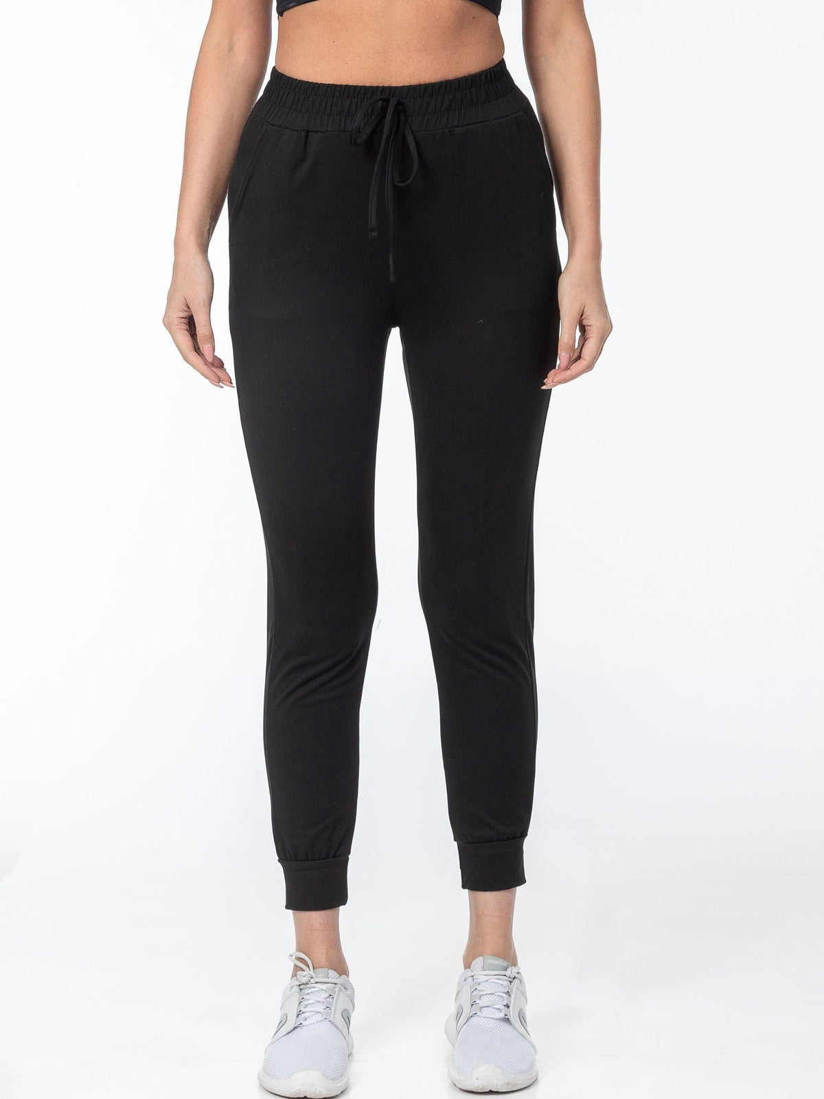 Black cuffed joggers with a drawstring waist, front view