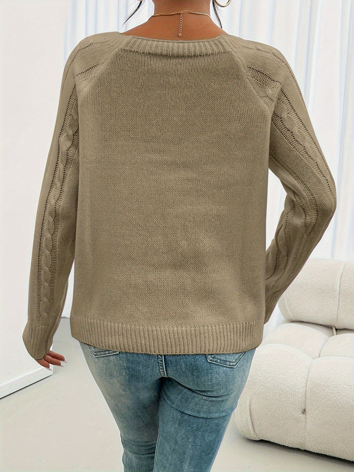 Back view of the khaki diamond cable knit sweater