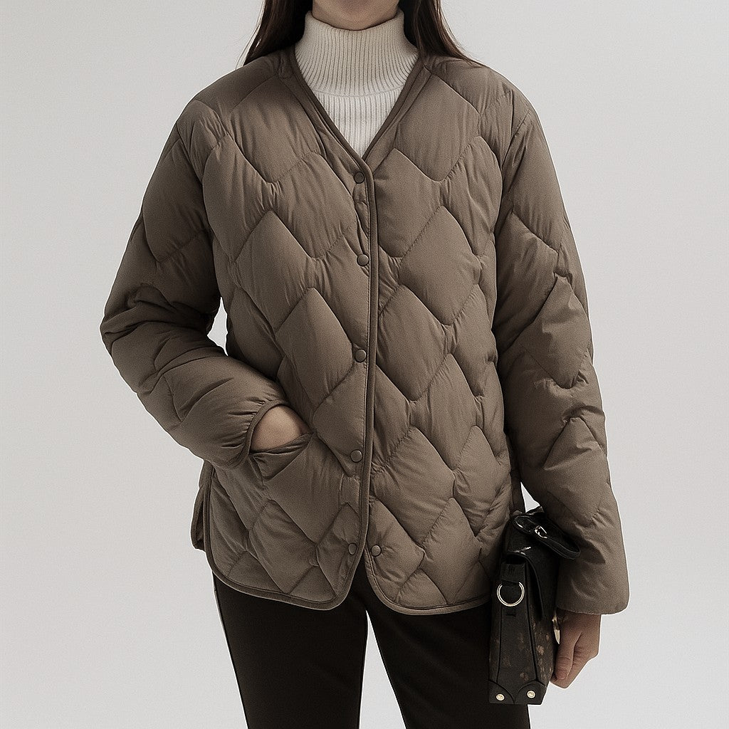 Taupe diamond quilted V-neck jacket worn, front
