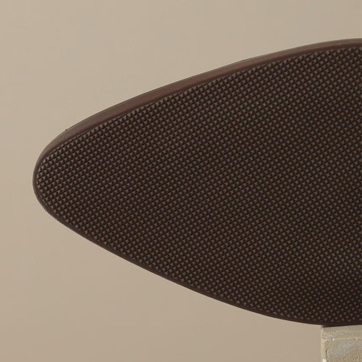Close up of the textured outsole of the ankle boot