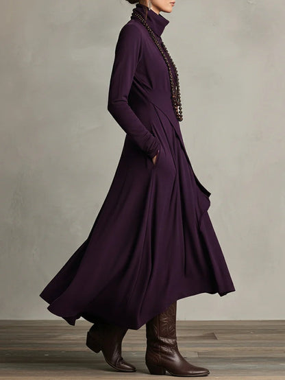 Plum draped maxi dress with a flowing hem, walking view