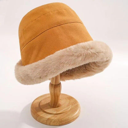 Mustard fur brim bucket hat, side view