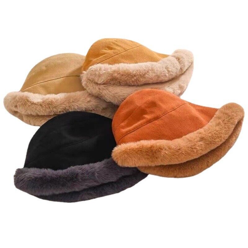 Fur brim bucket hats in black, rust and beige laid together