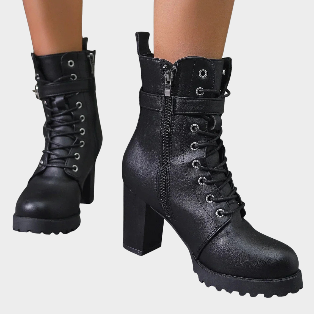 Black lace up combat boots with a side zip