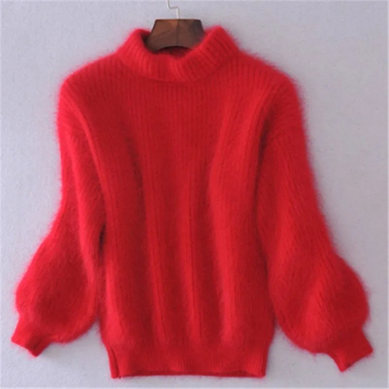 Red fluffy knit sweater with balloon sleeves on a hanger