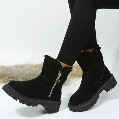 Black fur cuff platform boots worn with leggings, side view