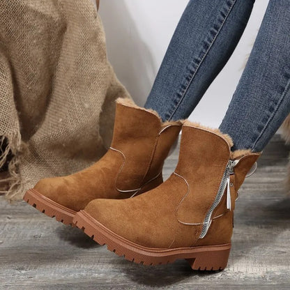 Camel fur cuff platform boots worn with jeans, side view