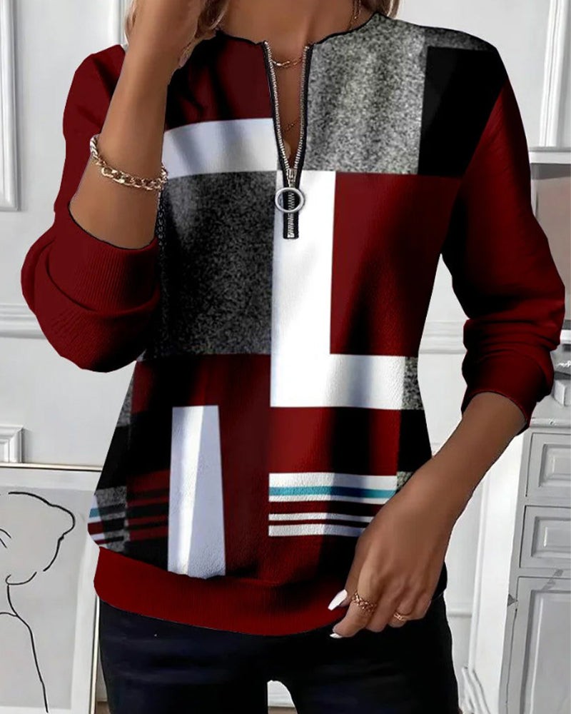 Burgundy geometric zip neck sweater with colorblock print, front view