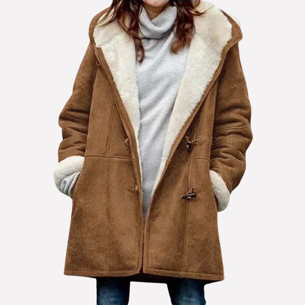 Brown hooded toggle front coat worn open over a gray top