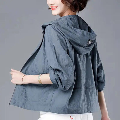 Slate grey hooded zip jacket worn, back view