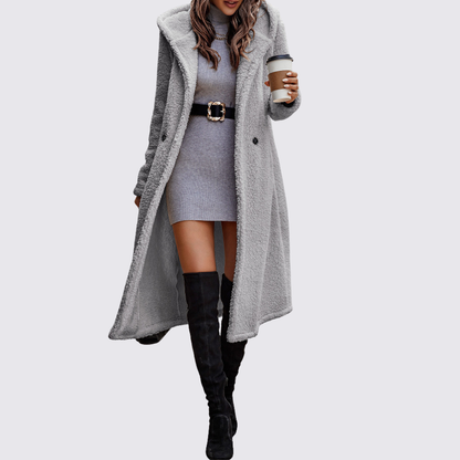 Light grey longline teddy fleece coat worn open over a grey knit dress, front view