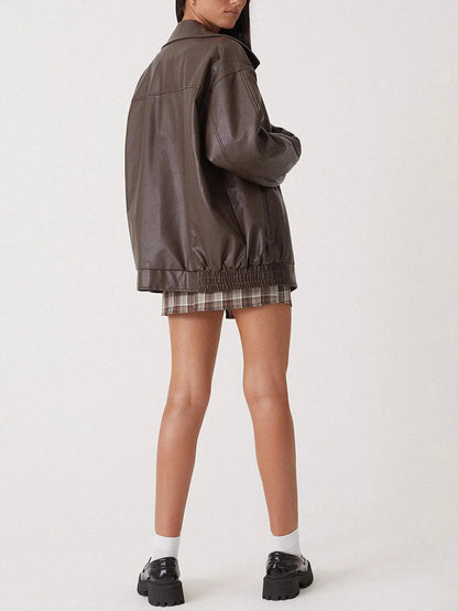 Brown oversized bomber jacket, back and side view with gathered hem