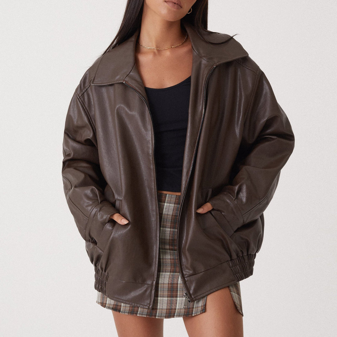 Brown oversized leather-look bomber worn, front