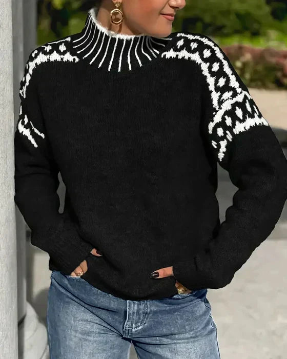 Black patterned yoke knit sweater with a white pattern