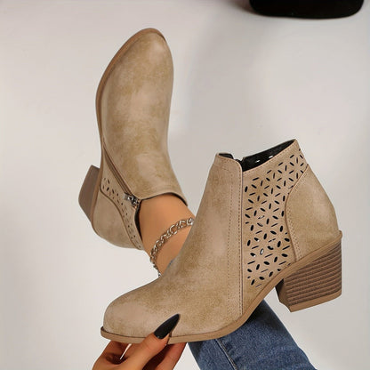 Beige perforated panel ankle boots, side view