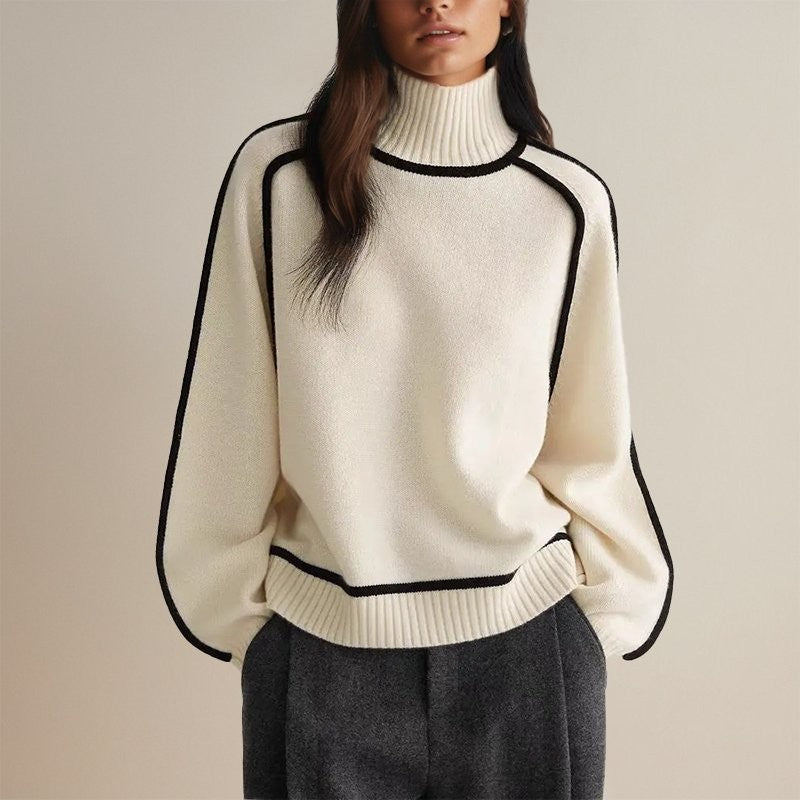 Cream oversized knit sweater with contrast piping, front view