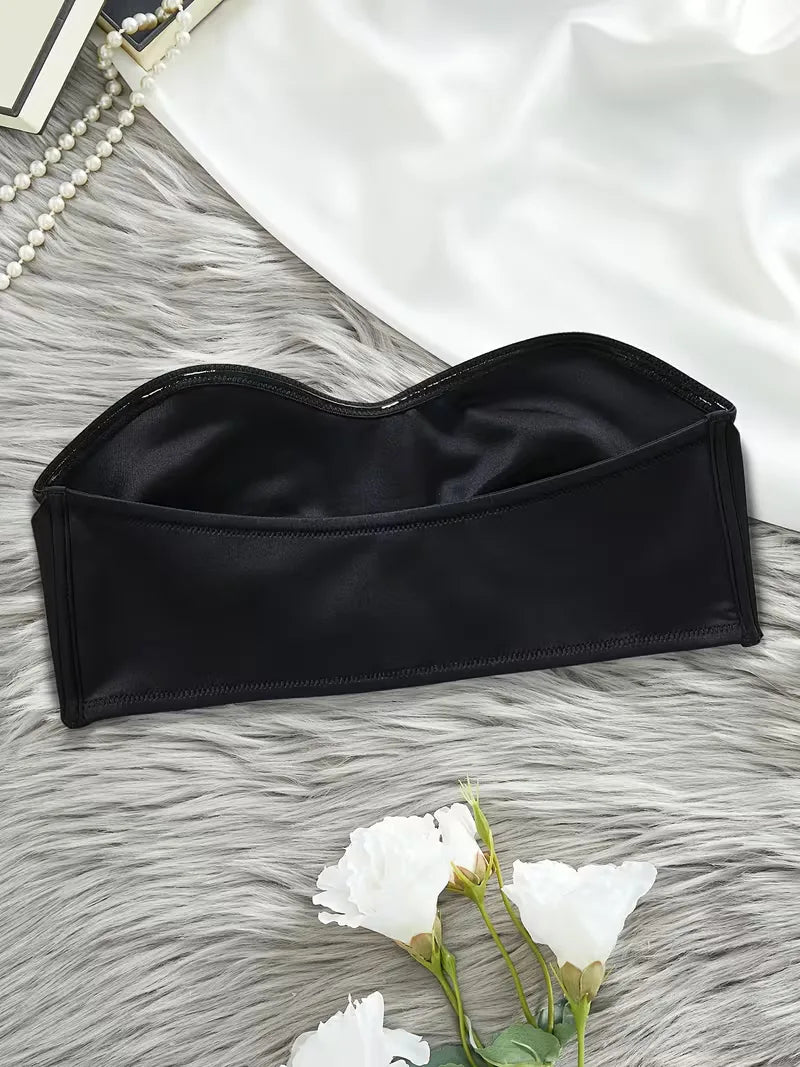 Black push up strapless bra laid flat