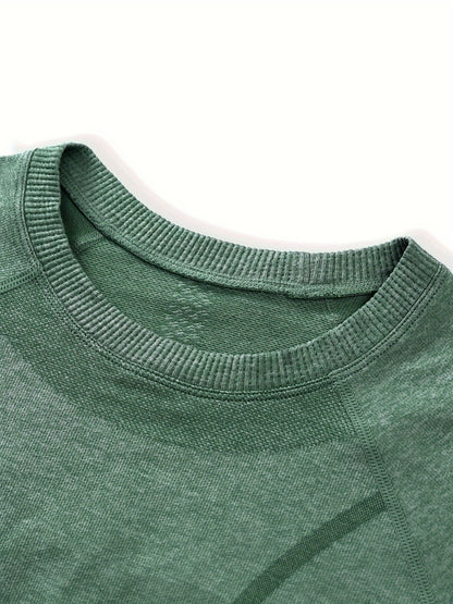 Close up of the green seamless knit crew neckline