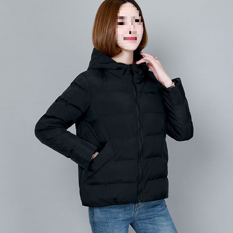 Black short hooded puffer jacket worn, front