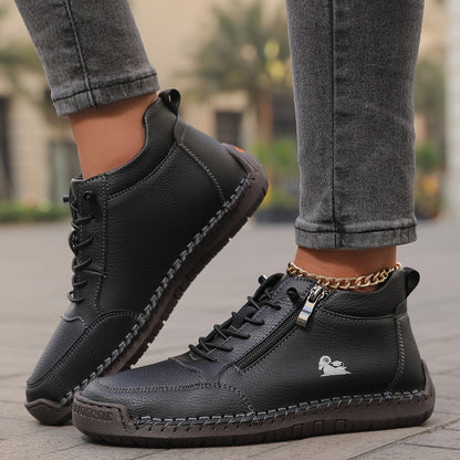 Women's lace-up side zip sneakers in black, side view showing the zip