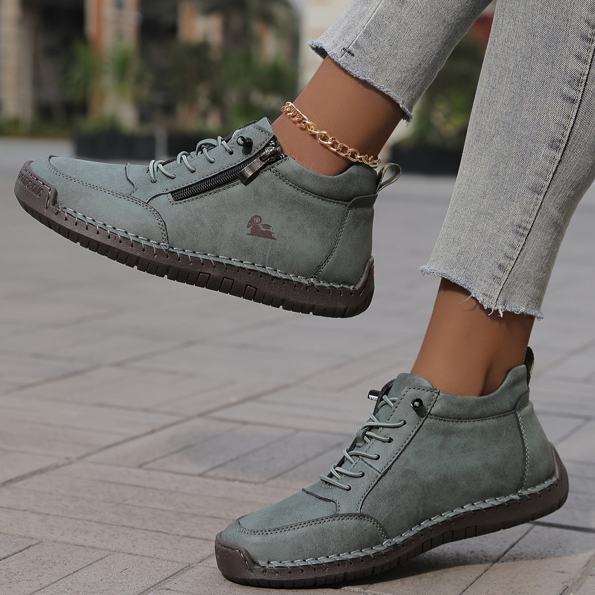 Women's lace-up side zip sneakers in green, outer and inner side view