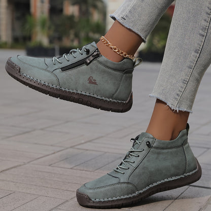 Women's lace-up side zip sneakers in green, outer and inner side view