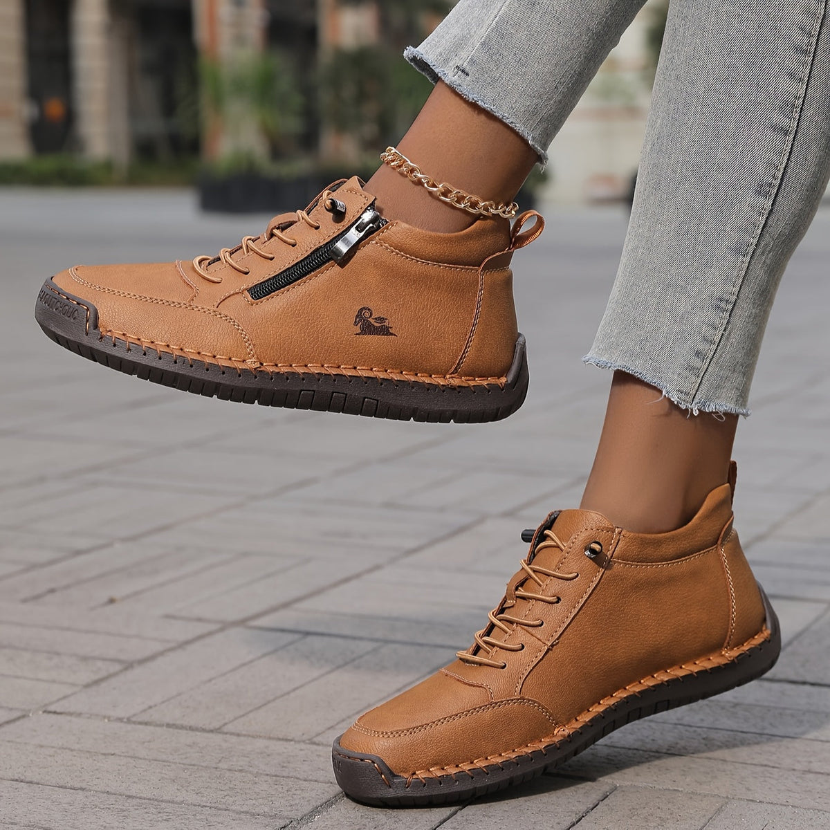 Women's lace-up side zip sneakers in tan, outer and inner side view