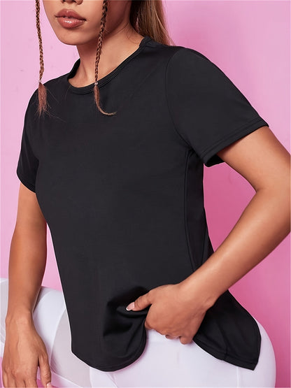 Black sport tee with a curved hem worn with white leggings