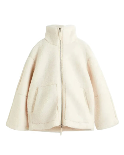 Cream teddy fleece jacket with patch pockets, front view on white