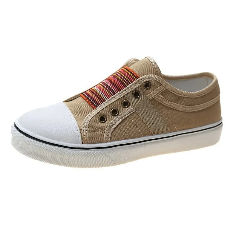 Khaki canvas slip-on sneaker with toe cap, side view