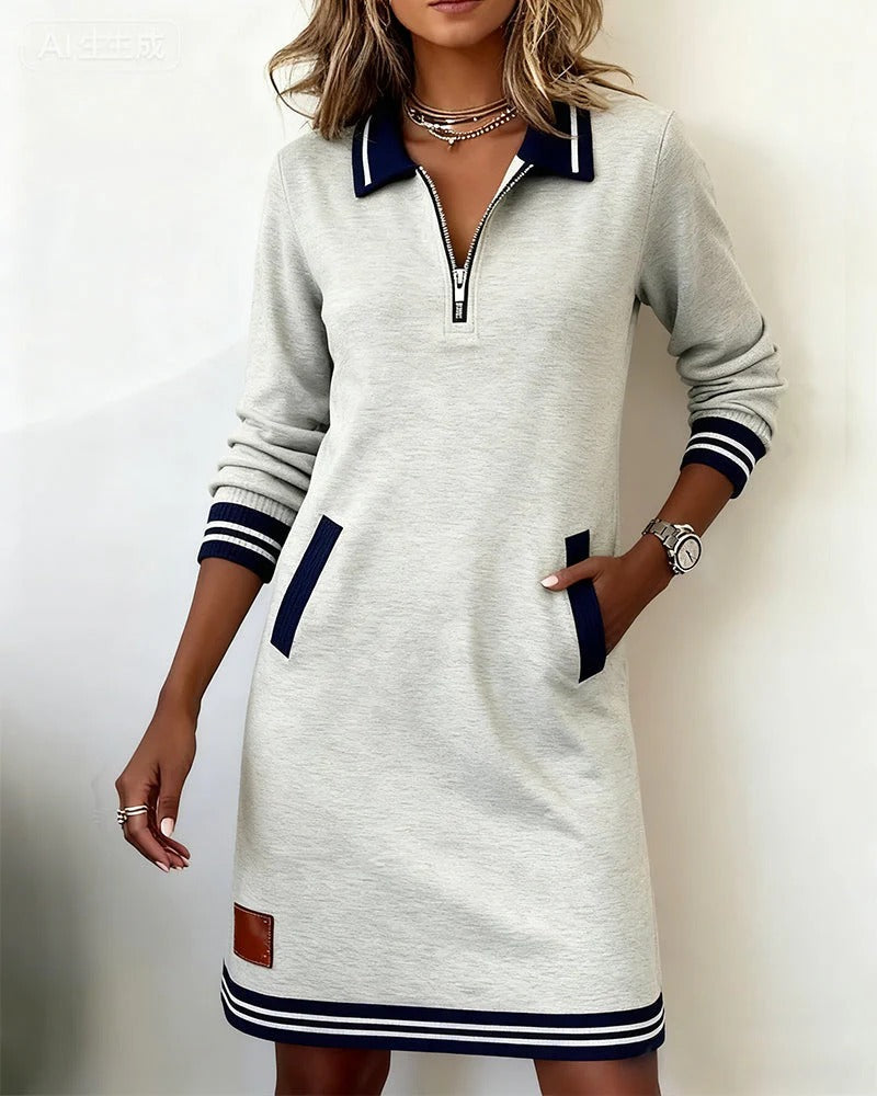 Gray polo dress with navy pocket trim