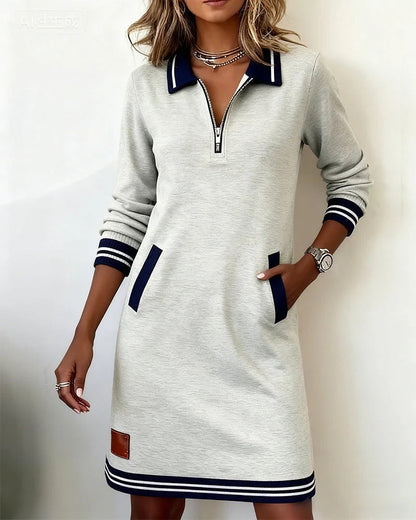 Gray polo dress with navy pocket trim