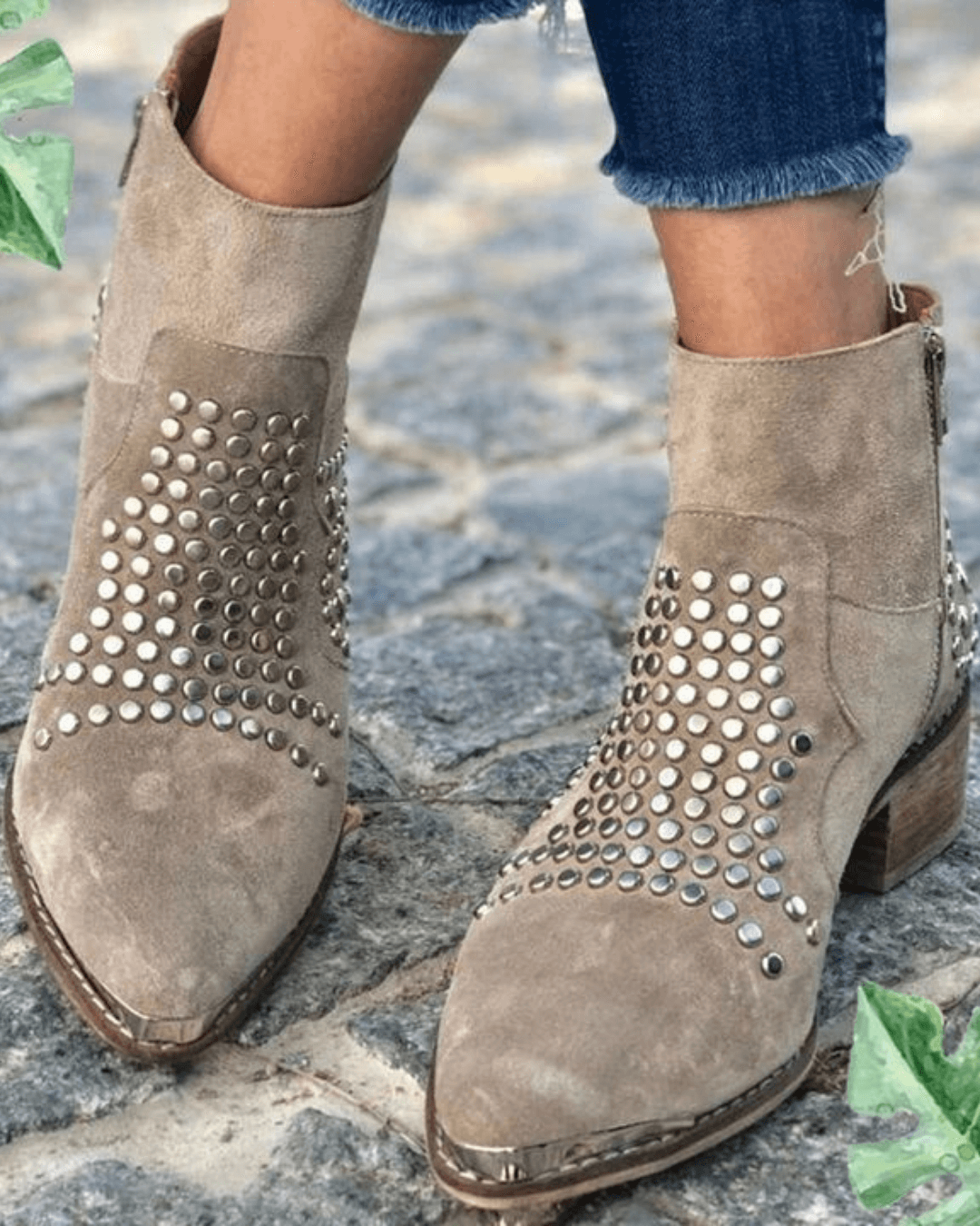 Taupe suede studded ankle boots worn with cropped jeans