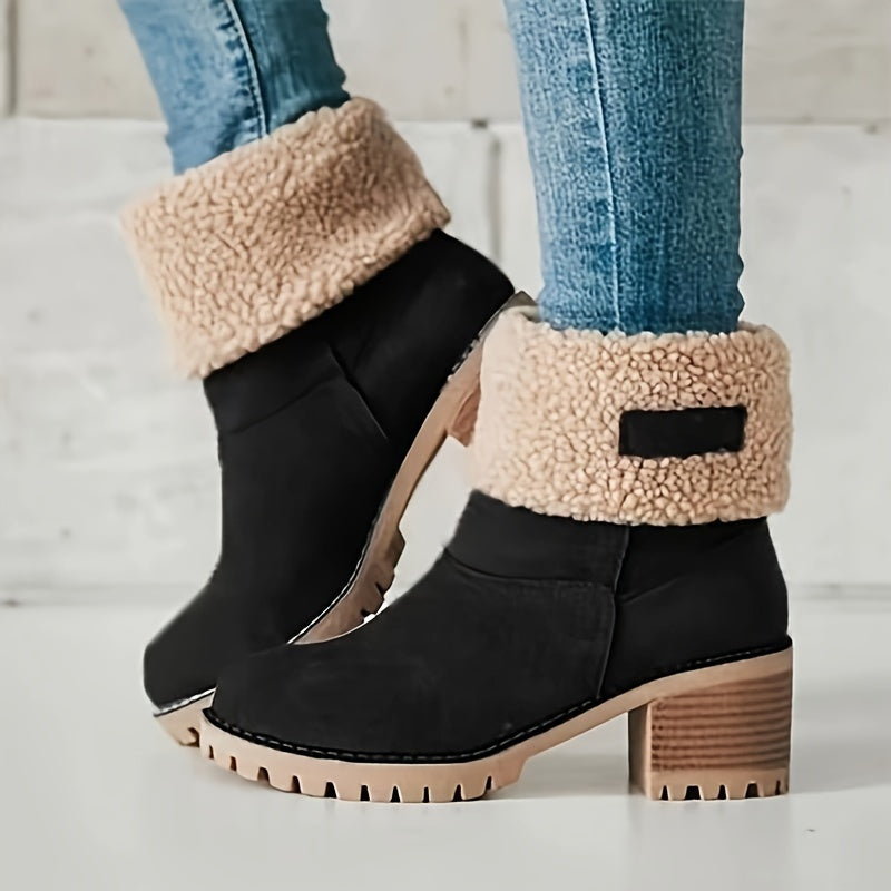 Black teddy cuff ankle boots worn with jeans, side view