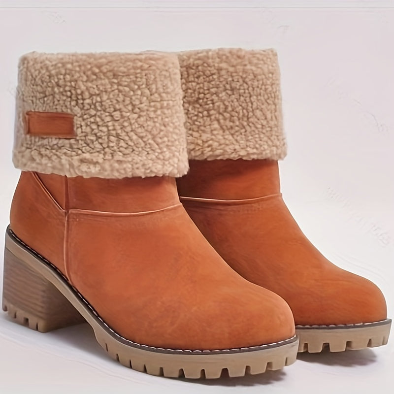 Orange faux suede ankle boots with a folded teddy cuff, product view