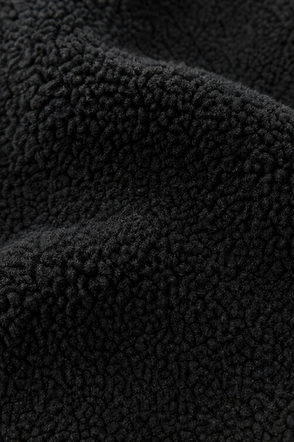 Close up of the black sherpa fleece pile