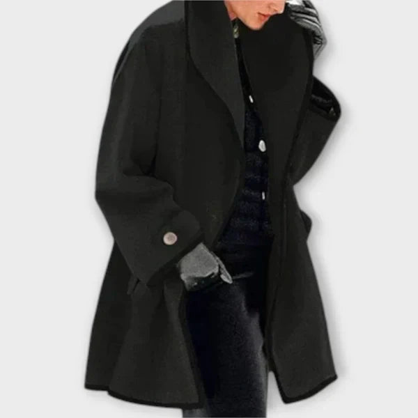 Black tailored coat with a shawl collar and tonal trim