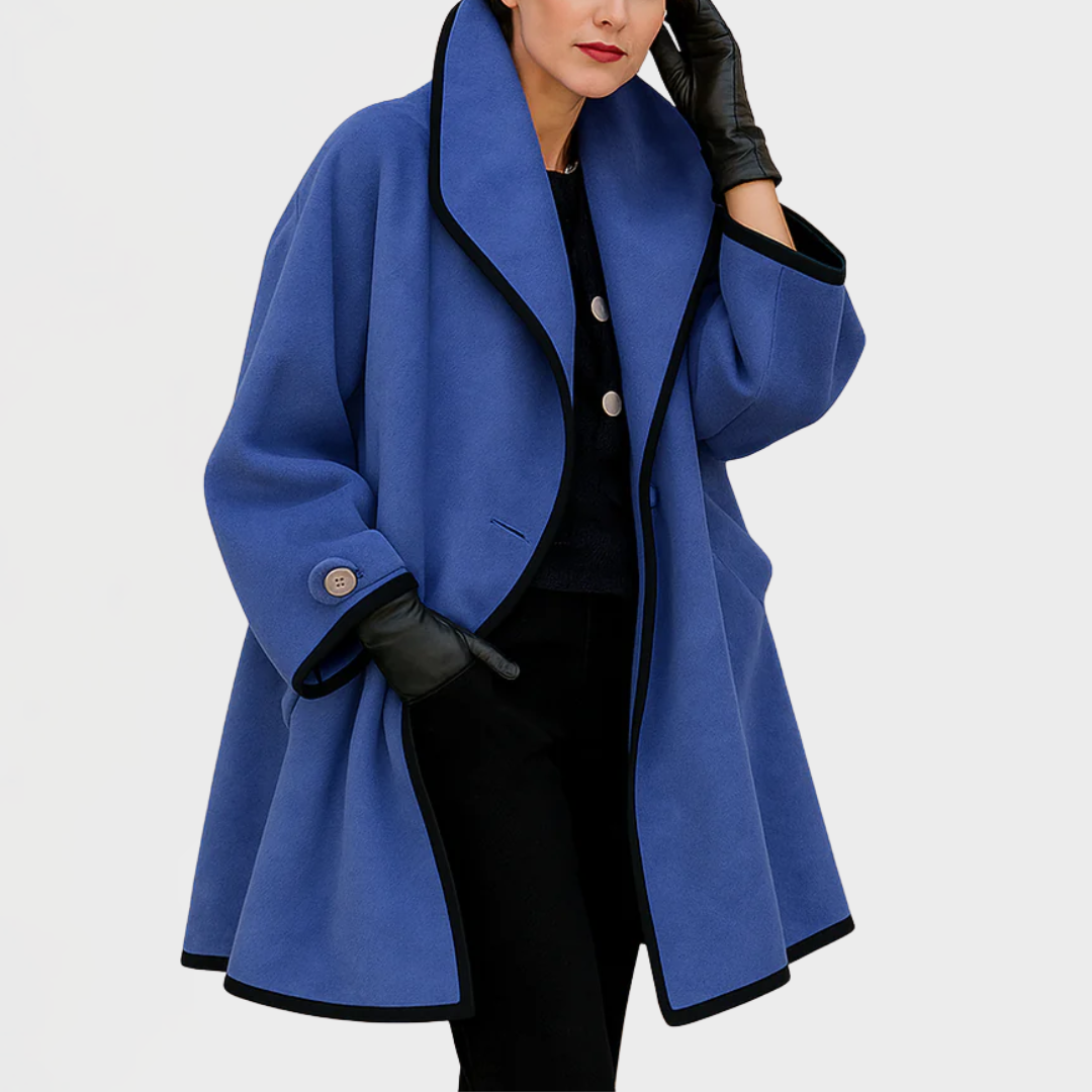 Blue tailored coat with a shawl collar and contrast trim
