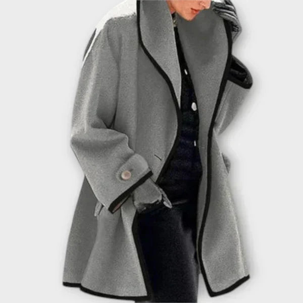 Grey tailored coat with a shawl collar and black trim