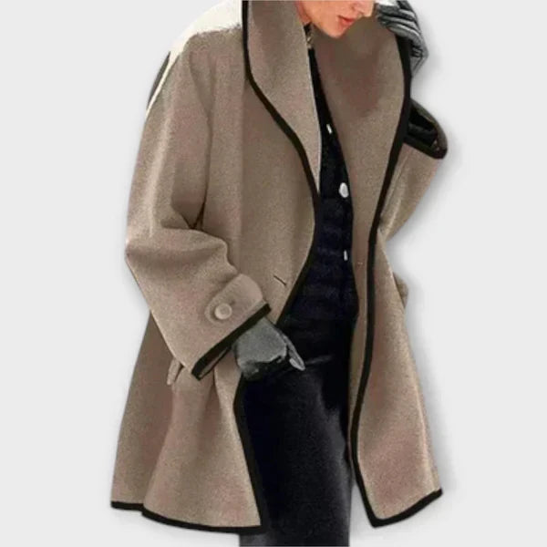 Taupe tailored coat with a shawl collar and black trim