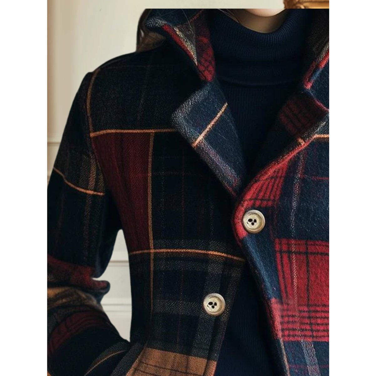 Close-up of the horn buttons on the plaid patchwork jacket