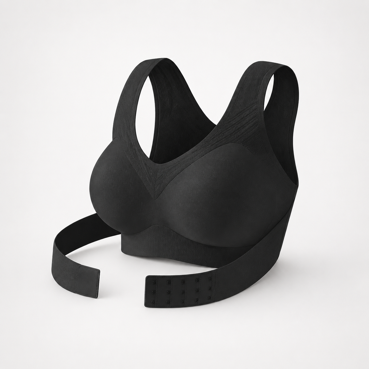 Black front-close wireless bra with cross-back straps on a plain backdrop