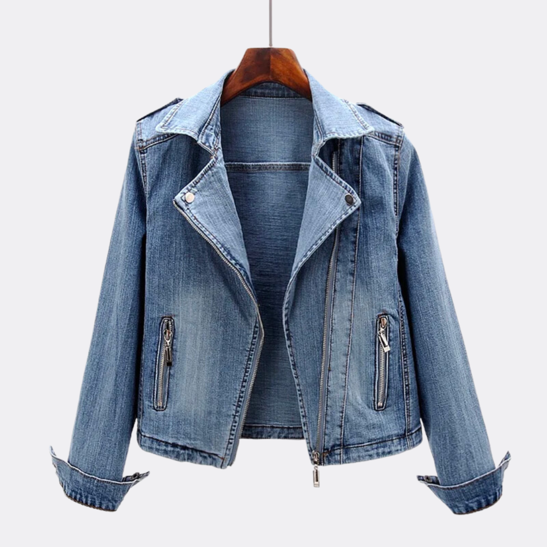 Light wash fitted denim moto jacket with zip pockets on a hanger